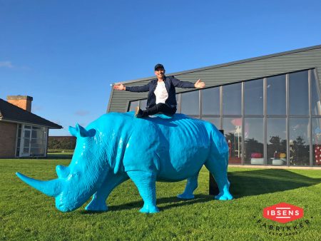 Think out of the box. Rhino's don't have to be grey