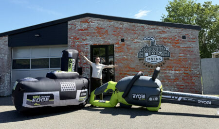 A 5-meter-long inflatable chainsaw and a 2-meter-high version of the battery and charger